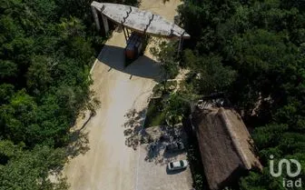 NEX-259421 - Terreno en Venta, con 402 m2 de construcción en Leona Vicario, CP 77590, Quintana Roo.