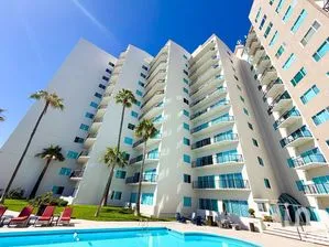 NEX-292404 - Departamento en Venta, con 2 recamaras, con 2 baños, con 118.6 m2 de construcción en Rosarito Centro, CP 22700, Baja California.