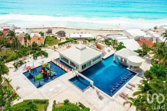 NEX-293136 - Departamento en Venta, con 1 baño, con 55.57 m2 de construcción en Zona Hotelera, CP 77500, Quintana Roo.