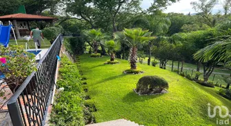 NEX-277897 - Casa en Venta, con 4 recamaras, con 4 baños, con 367 m2 de construcción en Club de Golf Santa Fe, CP 62790, Morelos.
